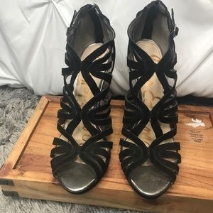 Black geometric cut out heels